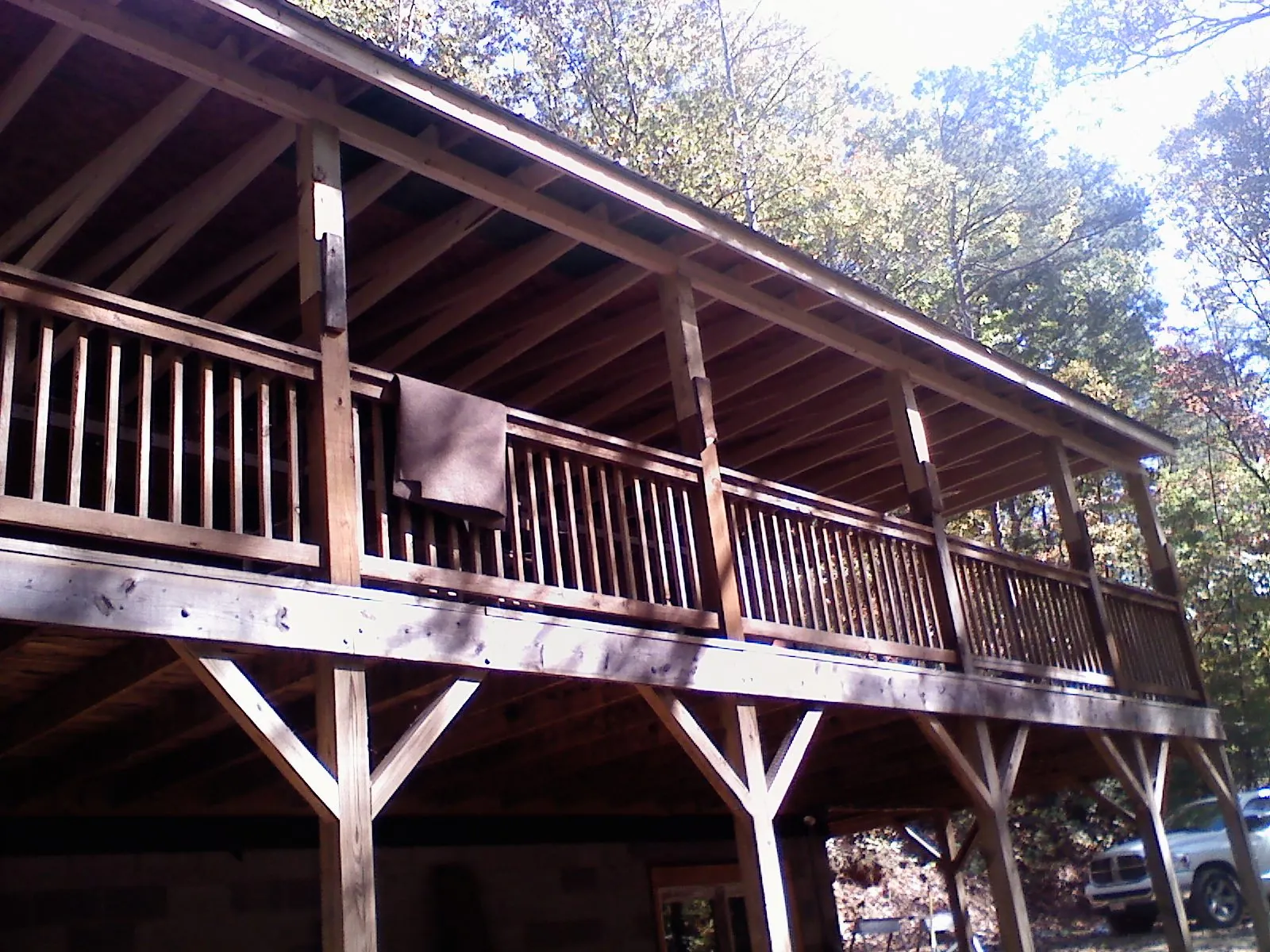 Timber framing under a new elevated porch and deck — Roof Leak Repair in Winooski by Roofing Brothers